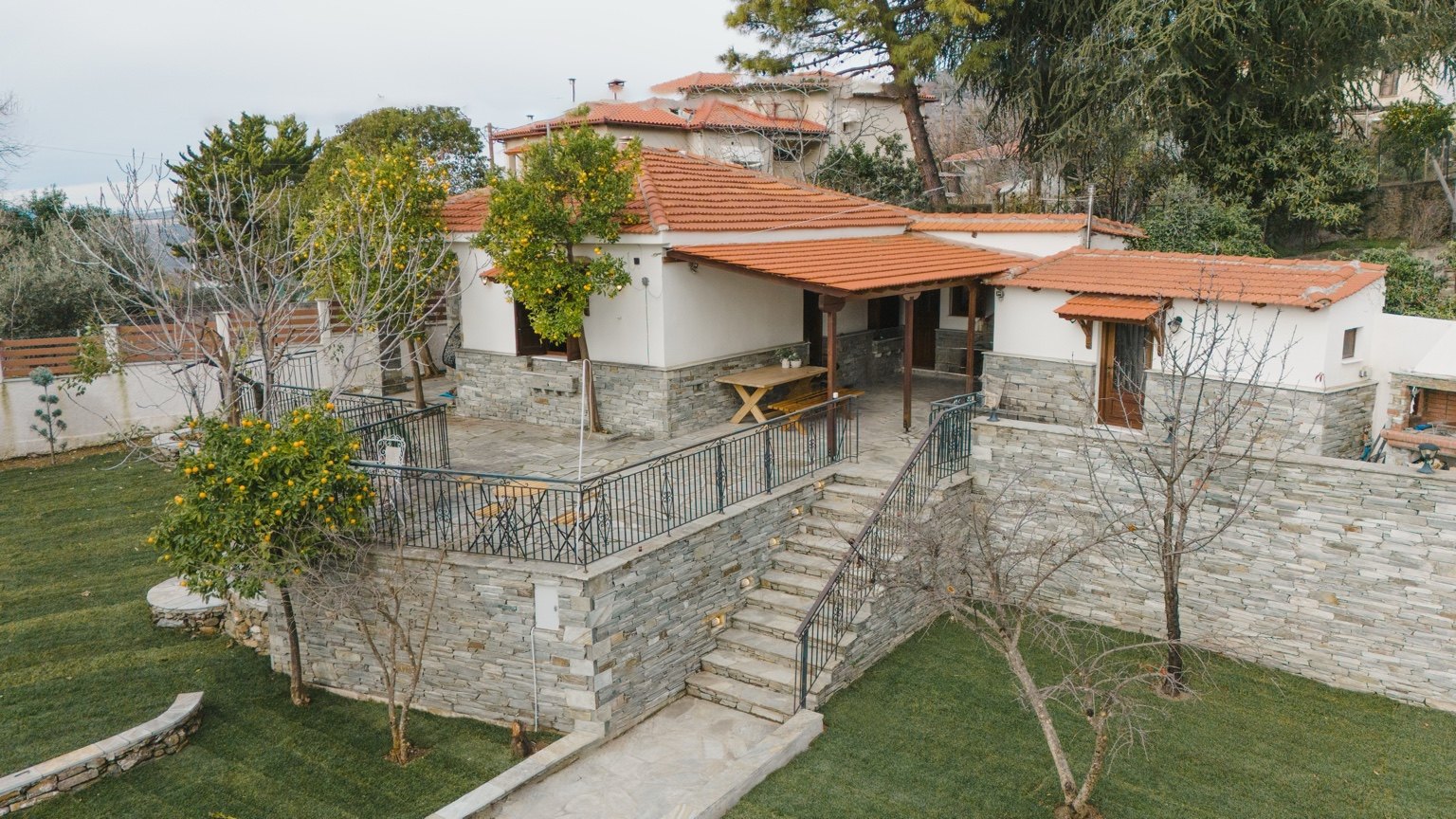 Traditional house and stone terrace